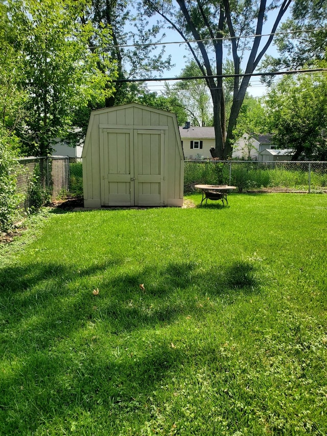 4917 Prairie Ave, Mchenry, IL 60050 - fenced backyard with a shed