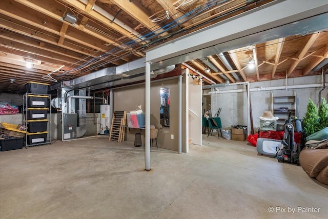 911 Water Stone Way, Malta, IL 60150 - unfinished basement featuring gas water heater and heating unit