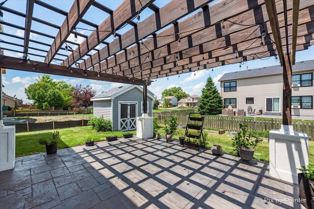 911 Water Stone Way, Malta, IL 60150 - view of patio / terrace with a storage shed and a pergola