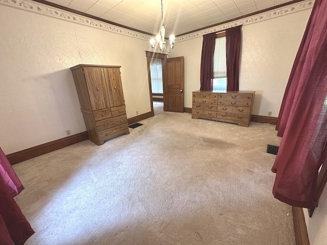 506 E Lincoln St, Saybrook, IL 61770 - unfurnished bedroom with carpet and a chandelier