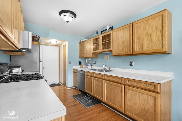 1644 Bridle Post Dr Unit 1644, Aurora, IL 60506 - kitchen featuring dishwasher, light countertops, light wood finished floors, and gas stove