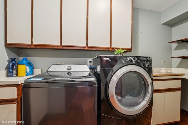 9228 S 55th Ct, Oak Lawn, IL 60453 - washroom featuring cabinet space, washing machine and dryer, and wood finished floors