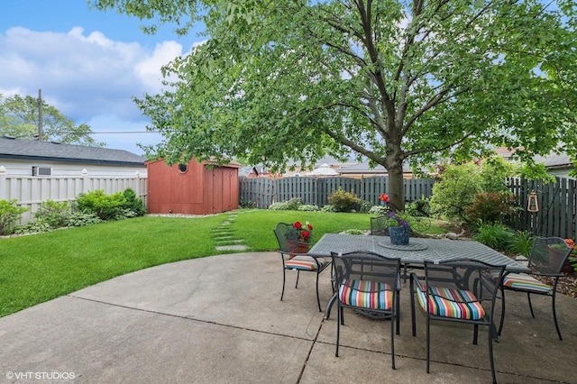 9228 S 55th Ct, Oak Lawn, IL 60453 - fenced backyard featuring a patio, a storage shed, and outdoor dining space