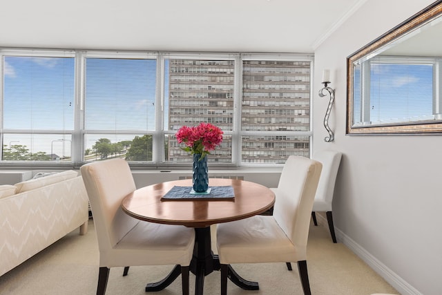 4800 S Chicago Beach Dr Unit 513N, Chicago, IL 60615 - carpeted dining area with baseboards and crown molding