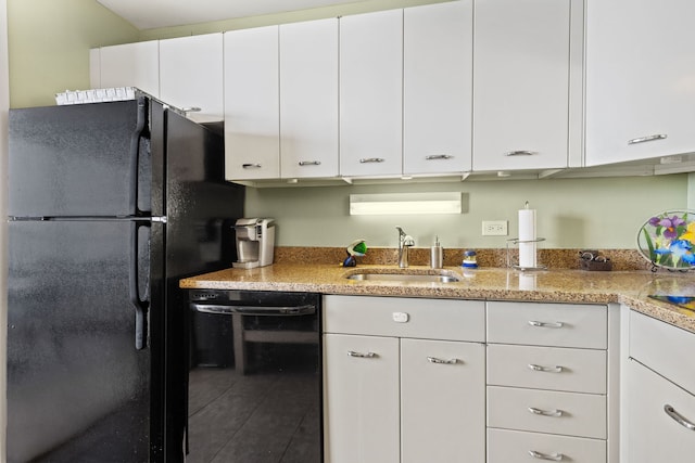 4800 S Chicago Beach Dr Unit 513N, Chicago, IL 60615 - kitchen featuring black appliances, white cabinets, and light stone counters