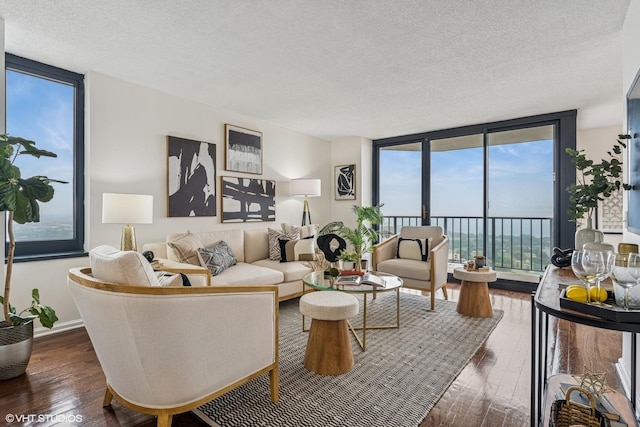 3660 N Lake Shore Dr Unit 4502, Chicago, IL 60613 - living area featuring a wall of windows, dark wood-type flooring, and a textured ceiling