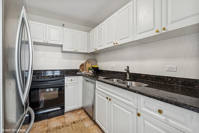 3660 N Lake Shore Dr Unit 4502, Chicago, IL 60613 - kitchen featuring appliances with stainless steel finishes, backsplash, white cabinets, and dark stone counters