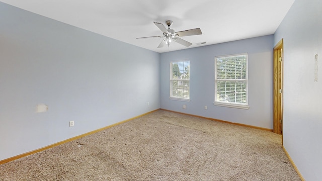 256 Stamford Ln, Romeoville, IL 60446 - spare room featuring carpet flooring and a ceiling fan
