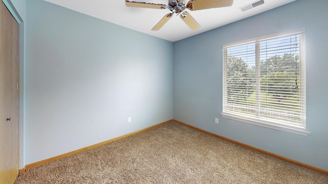 256 Stamford Ln, Romeoville, IL 60446 - spare room with healthy amount of natural light, light colored carpet, and a ceiling fan