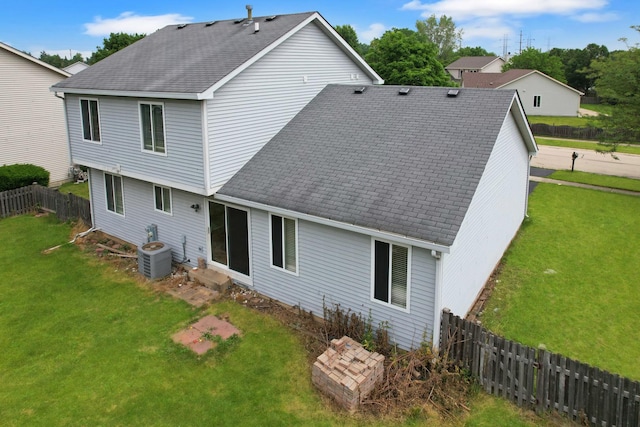 256 Stamford Ln, Romeoville, IL 60446 - rear view of house featuring a shingled roof