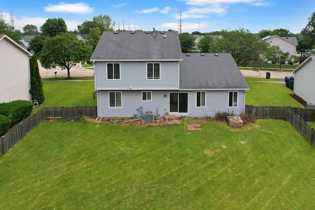 256 Stamford Ln, Romeoville, IL 60446 - back of house featuring roof with shingles, a fenced backyard, and entry steps