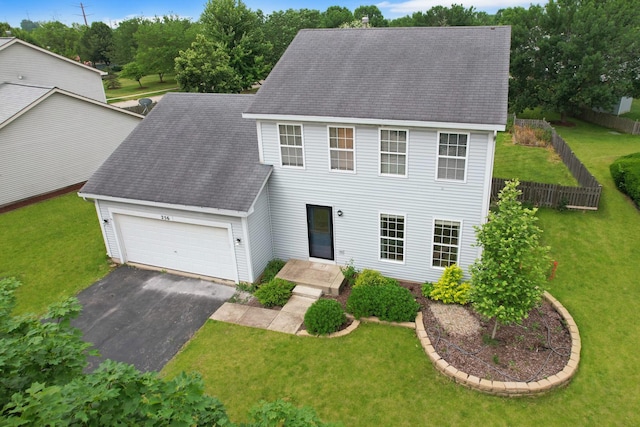 256 Stamford Ln, Romeoville, IL 60446 - colonial house featuring an attached garage, asphalt driveway, and a shingled roof