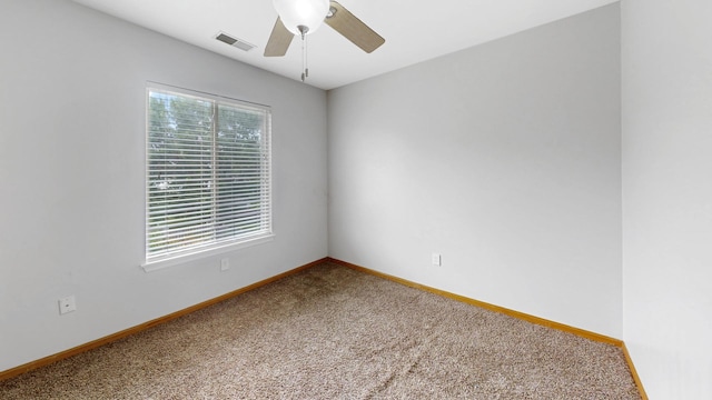 256 Stamford Ln, Romeoville, IL 60446 - carpeted spare room featuring ceiling fan and baseboards