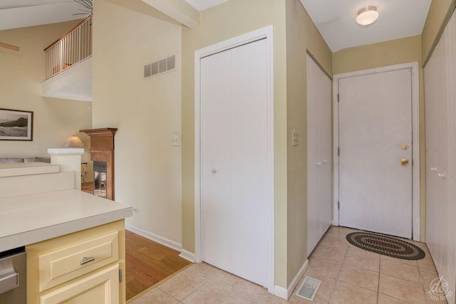 1288 Seabury Cir, Carol Stream, IL 60188 - foyer featuring light tile patterned flooring and a fireplace