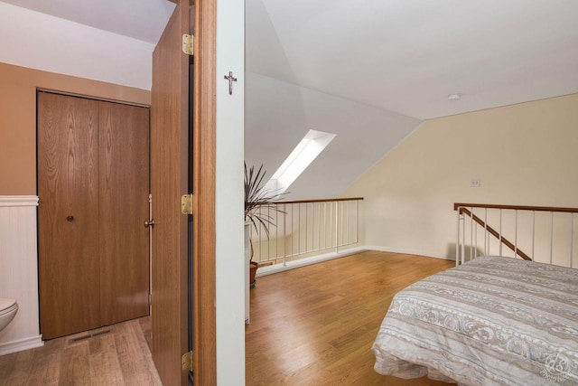 1288 Seabury Cir, Carol Stream, IL 60188 - bedroom featuring wood finished floors, lofted ceiling, and a closet