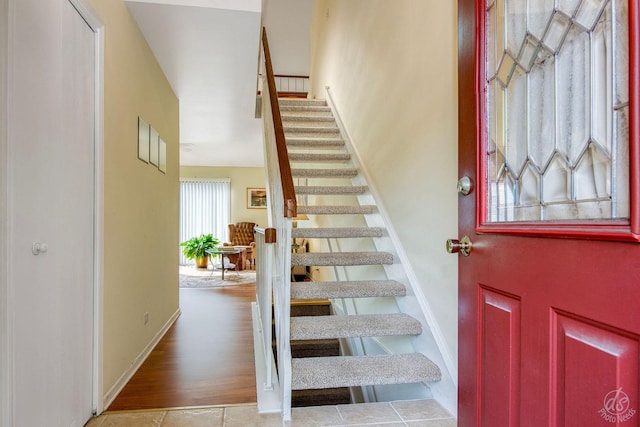 1288 Seabury Cir, Carol Stream, IL 60188 - foyer entrance with stairway and baseboards