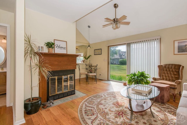 1288 Seabury Cir, Carol Stream, IL 60188 - living room with light wood-style flooring, ceiling fan, a multi sided fireplace, and lofted ceiling