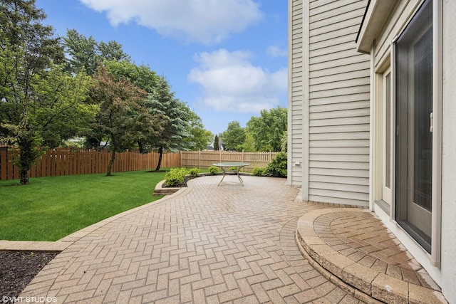 1040 E Buckingham Dr, Naperville, IL 60563 - fenced backyard featuring a patio area
