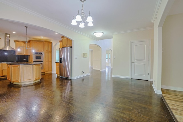 200 Ahmed Ct, Glendale Heights, IL 60139 - kitchen with appliances with stainless steel finishes, wall chimney range hood, arched walkways, dark countertops, and crown molding