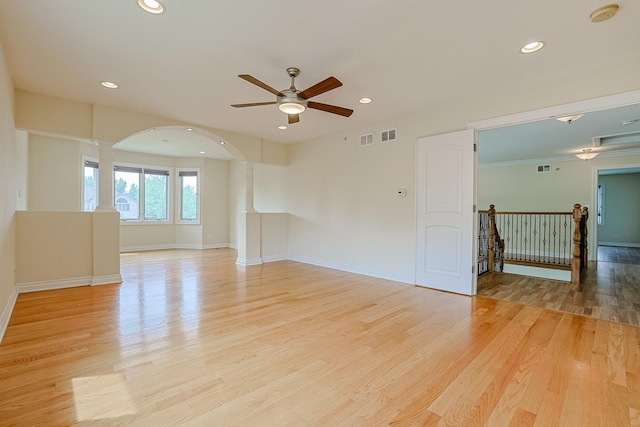 200 Ahmed Ct, Glendale Heights, IL 60139 - empty room with ceiling fan, recessed lighting, light wood finished floors, a smoke detector, and arched walkways