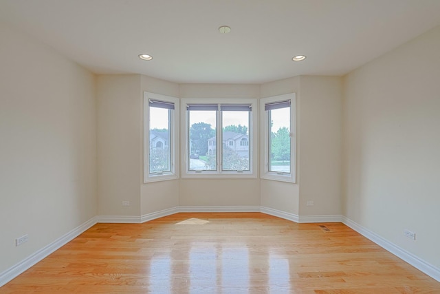 200 Ahmed Ct, Glendale Heights, IL 60139 - unfurnished room featuring light wood-style flooring and recessed lighting