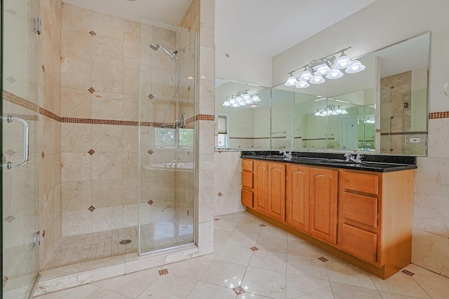 200 Ahmed Ct, Glendale Heights, IL 60139 - bathroom featuring tile walls, a shower stall, vanity, ceiling fan, and tile patterned floors