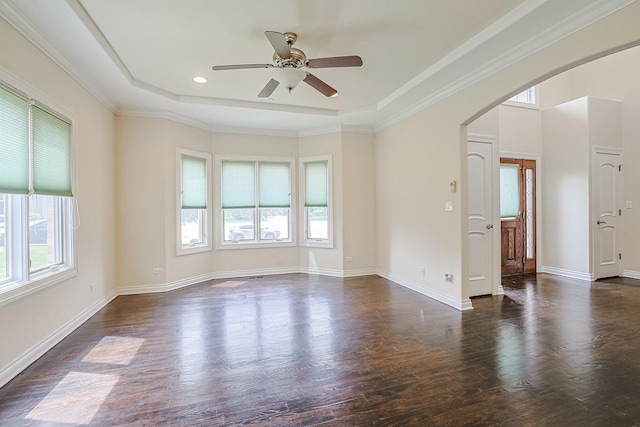 200 Ahmed Ct, Glendale Heights, IL 60139 - spare room featuring a tray ceiling, a ceiling fan, dark wood-style floors, arched walkways, and recessed lighting