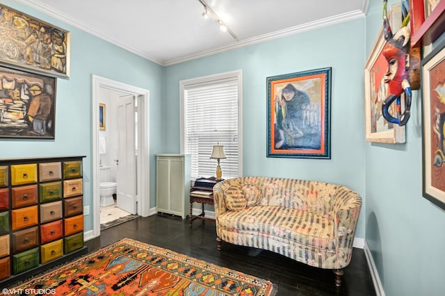 1116 W N Shore Ave Unit 2, Chicago, IL 60626 - living area with rail lighting, dark wood-style floors, and ornamental molding