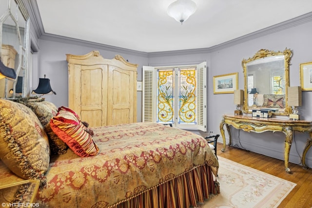 1116 W N Shore Ave Unit 2, Chicago, IL 60626 - bedroom with wood finished floors and crown molding