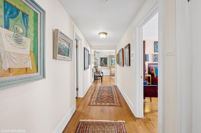 1116 W N Shore Ave Unit 2, Chicago, IL 60626 - hallway with light wood-style floors