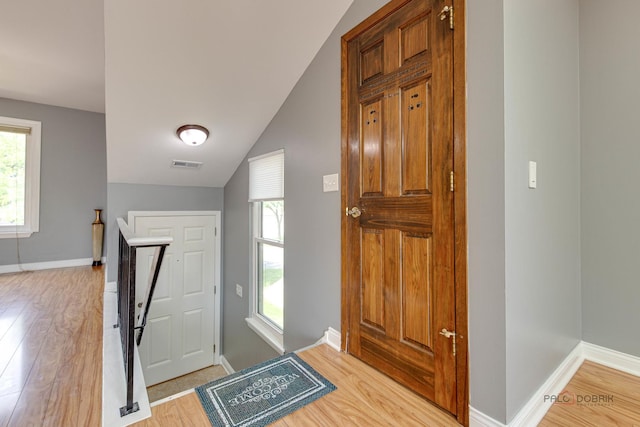 923 Manchester Cir Unit 923, Schaumburg, IL 60193 - foyer entrance with light wood-type flooring and lofted ceiling