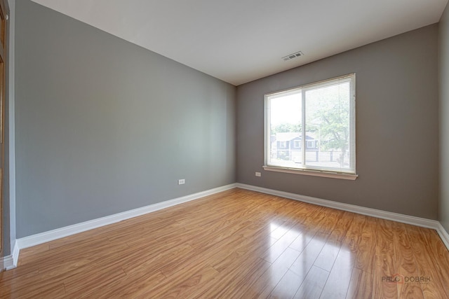923 Manchester Cir Unit 923, Schaumburg, IL 60193 - empty room featuring baseboards and light wood-type flooring