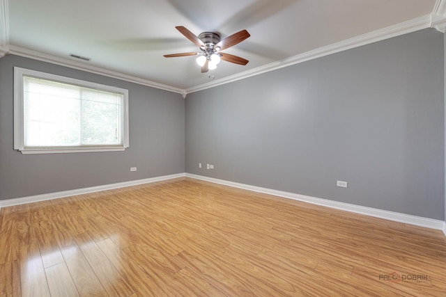 923 Manchester Cir Unit 923, Schaumburg, IL 60193 - unfurnished room featuring ceiling fan, light wood-style flooring, and crown molding