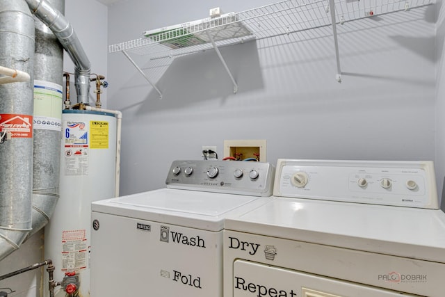 923 Manchester Cir Unit 923, Schaumburg, IL 60193 - washroom with water heater and separate washer and dryer