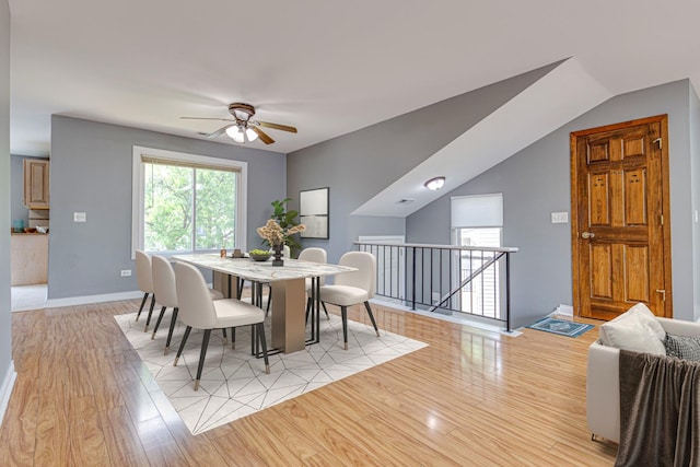 923 Manchester Cir Unit 923, Schaumburg, IL 60193 - dining room with light wood-style floors and a ceiling fan