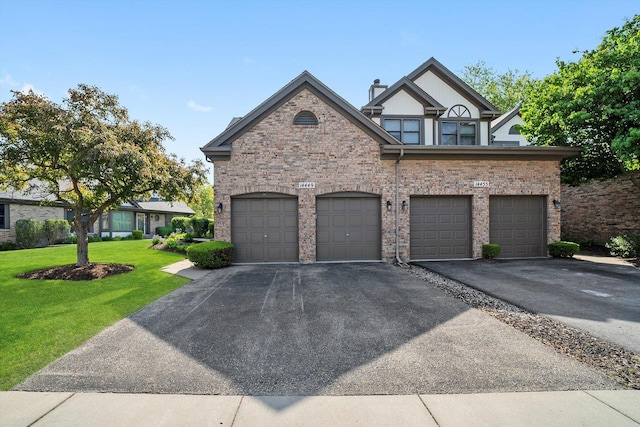 14449 Golf Rd, Orland Park, IL 60462 - view of front of home featuring a front lawn, a garage, driveway, and brick siding