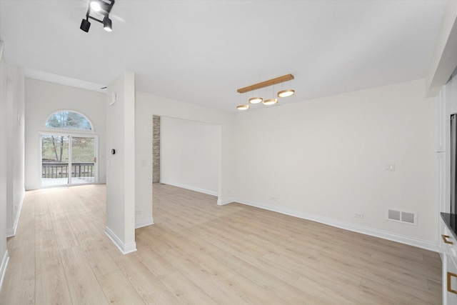 14449 Golf Rd, Orland Park, IL 60462 - unfurnished living room featuring light wood finished floors and baseboards