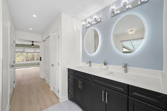 14449 Golf Rd, Orland Park, IL 60462 - bathroom with double vanity, ceiling fan, recessed lighting, and wood finished floors