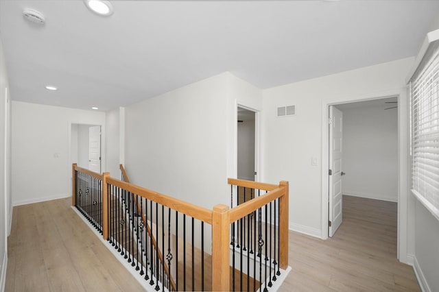 14449 Golf Rd, Orland Park, IL 60462 - corridor with an upstairs landing, light wood finished floors, and recessed lighting