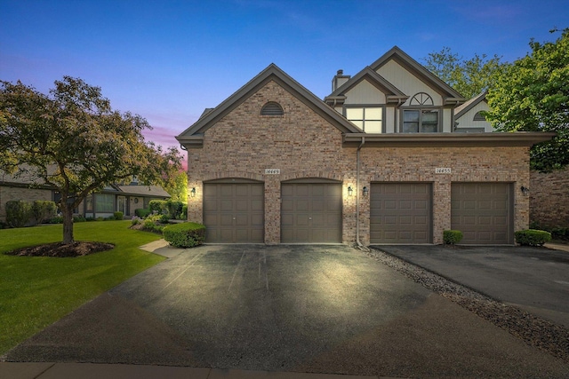 14449 Golf Rd, Orland Park, IL 60462 - english style home with a front yard and brick siding