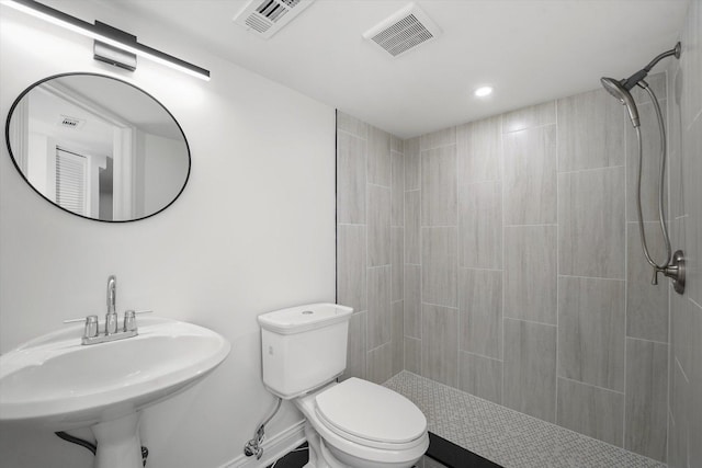14449 Golf Rd, Orland Park, IL 60462 - bathroom featuring a tile shower and recessed lighting