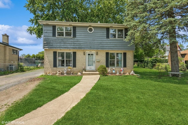 852 Pamela Dr, Bensenville, IL 60106 - colonial house with brick siding