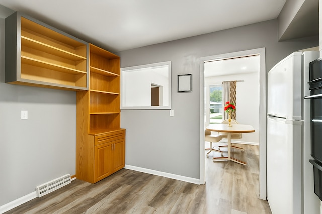 852 Pamela Dr, Bensenville, IL 60106 - unfurnished dining area featuring wood finished floors
