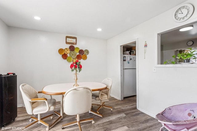 852 Pamela Dr, Bensenville, IL 60106 - dining area with wood finished floors and recessed lighting