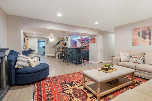 661 Regal Ln, Algonquin, IL 60102 - living room with a bar, light wood-style floors, recessed lighting, and stairs