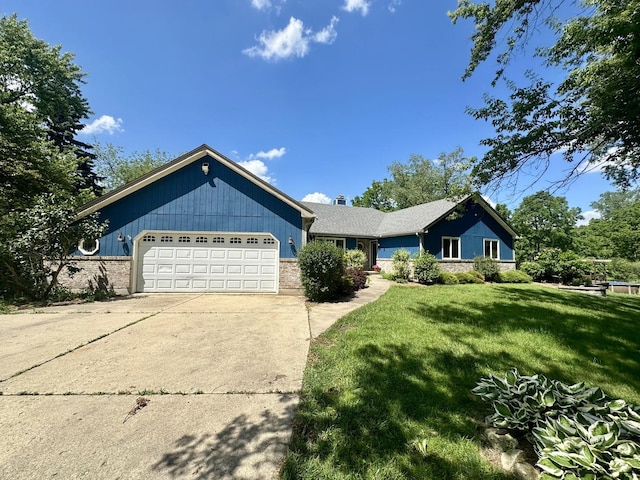 5N119 Mary Ct, Saint Charles, IL 60175 - ranch-style home with an attached garage, driveway, and a front lawn