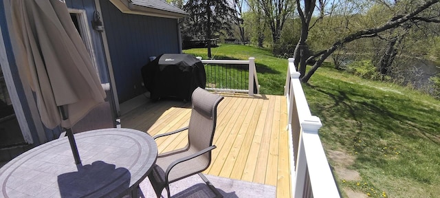 5N119 Mary Ct, Saint Charles, IL 60175 - wooden deck featuring area for grilling, outdoor dining space, and a yard