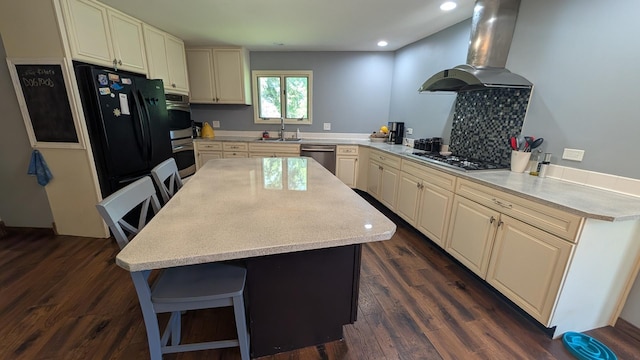 5N119 Mary Ct, Saint Charles, IL 60175 - kitchen with range hood, appliances with stainless steel finishes, a breakfast bar, recessed lighting, and light countertops