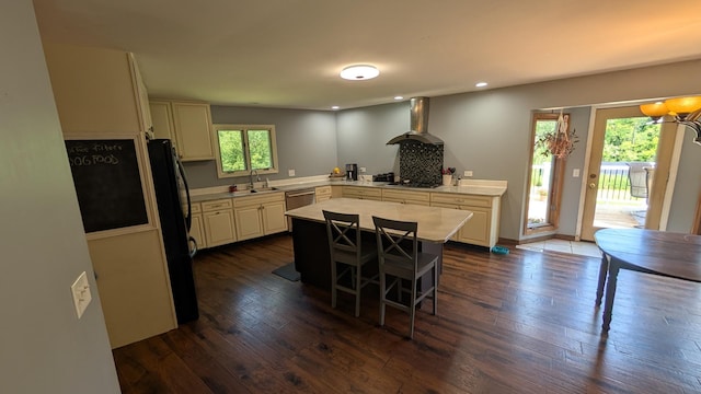 5N119 Mary Ct, Saint Charles, IL 60175 - kitchen featuring wall chimney exhaust hood, light countertops, plenty of natural light, dark wood-style floors, and recessed lighting