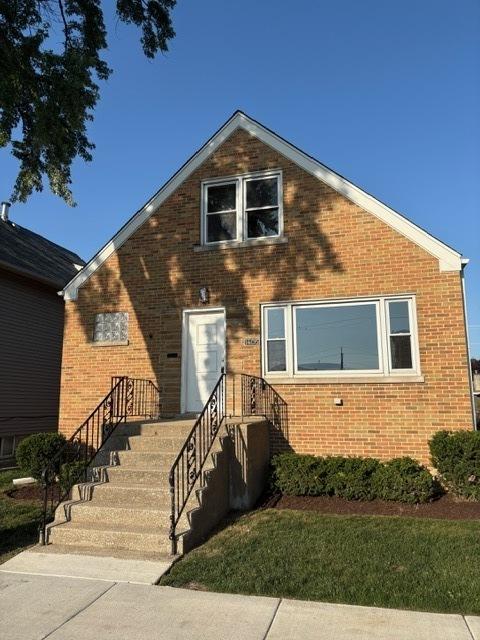 1405 N 24th Ave, Melrose Park, IL 60160 - view of front facade with brick siding and a front lawn